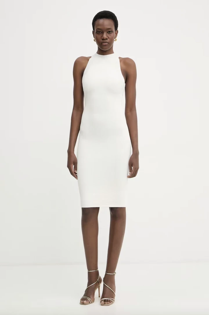 The minimalist sleeveless midi dress is the most fashionable comeback from the 1990s for fans of simplicity9